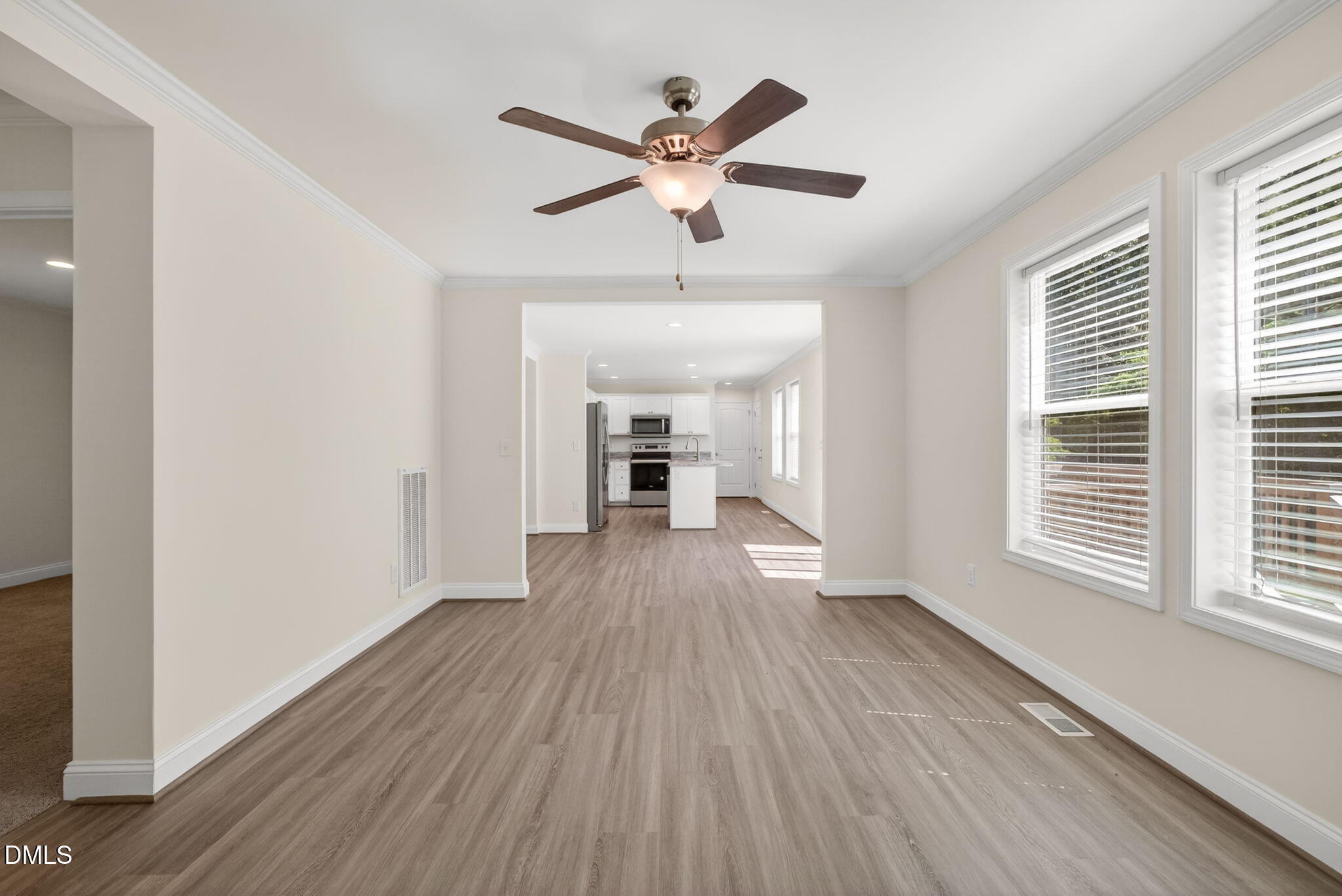 7122 Guess Road Hillsborough, NC 27278 - Photo 15 of 48 wooden floor in an empty room with a window