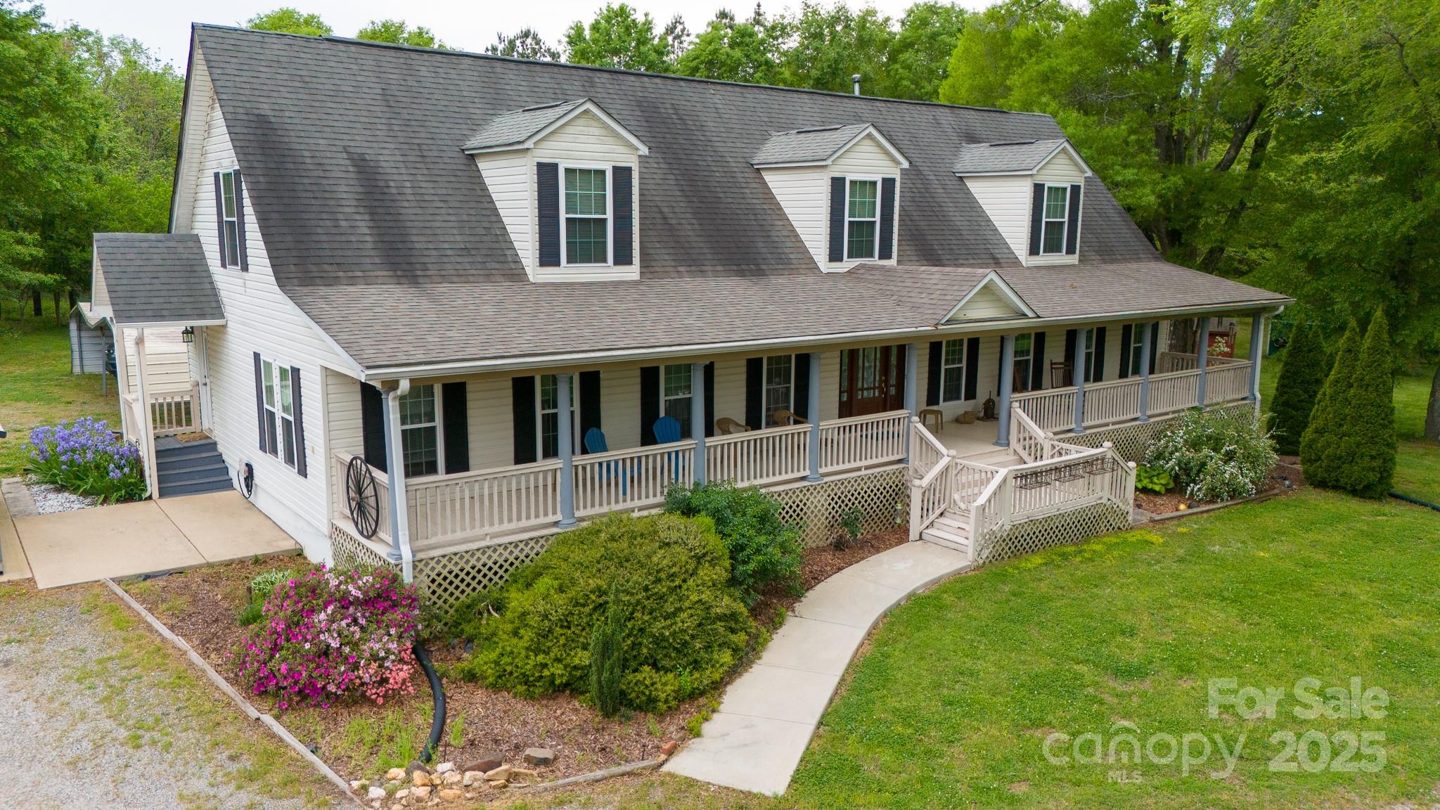 3199 Harmony Road Catawba, SC 29704 - Photo 1 of 46 a house with garden in front of it