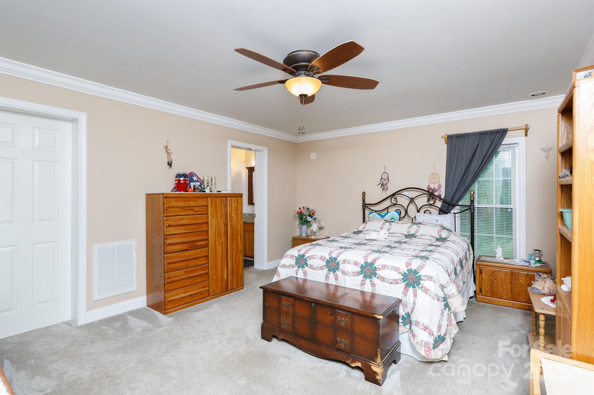 3199 Harmony Road Catawba, SC 29704 - Photo 13 of 46 a bedroom with bed and window
