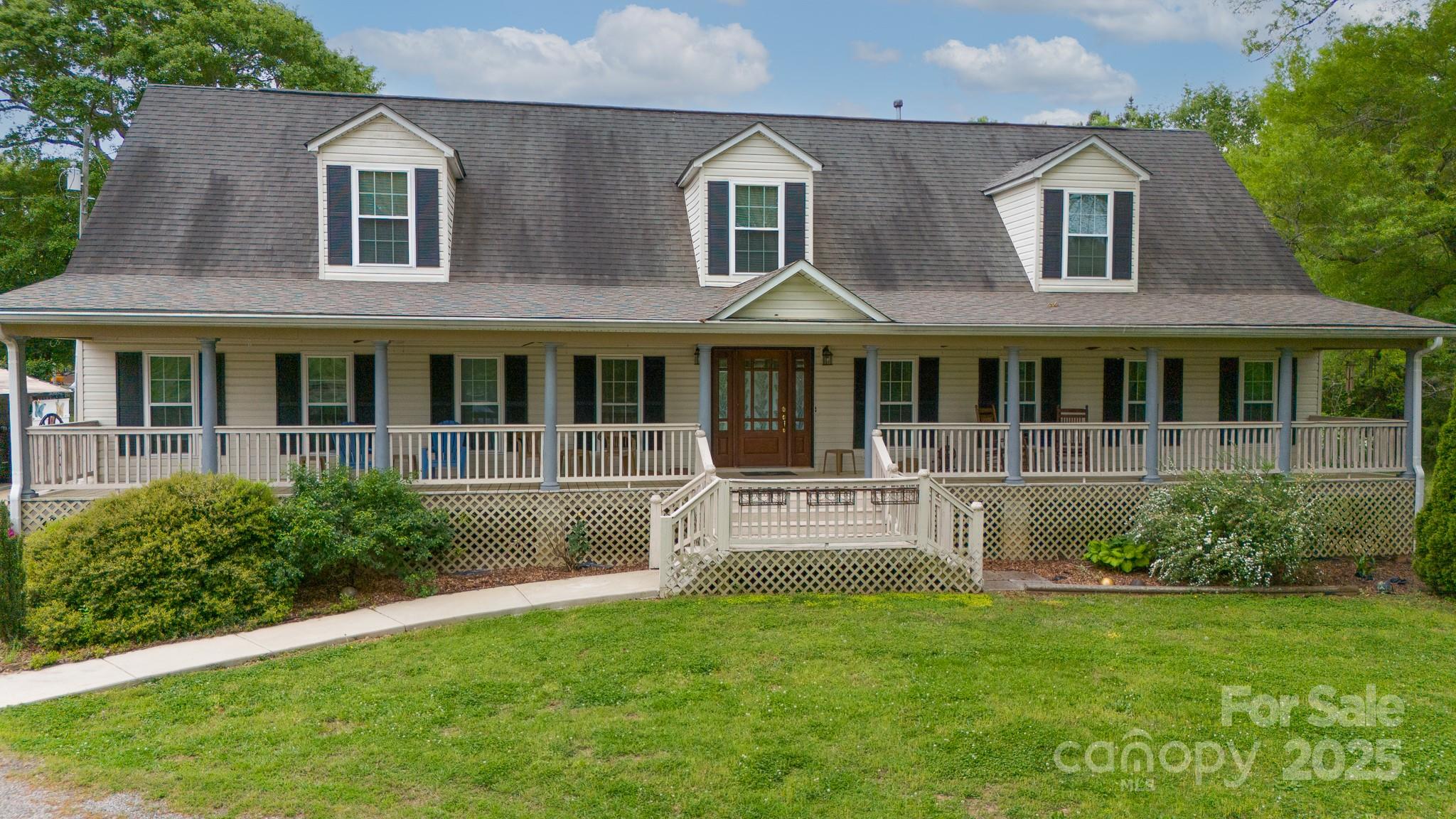 3199 Harmony Road Catawba, SC 29704 - Photo 2 of 46 a front view of a house with a yard