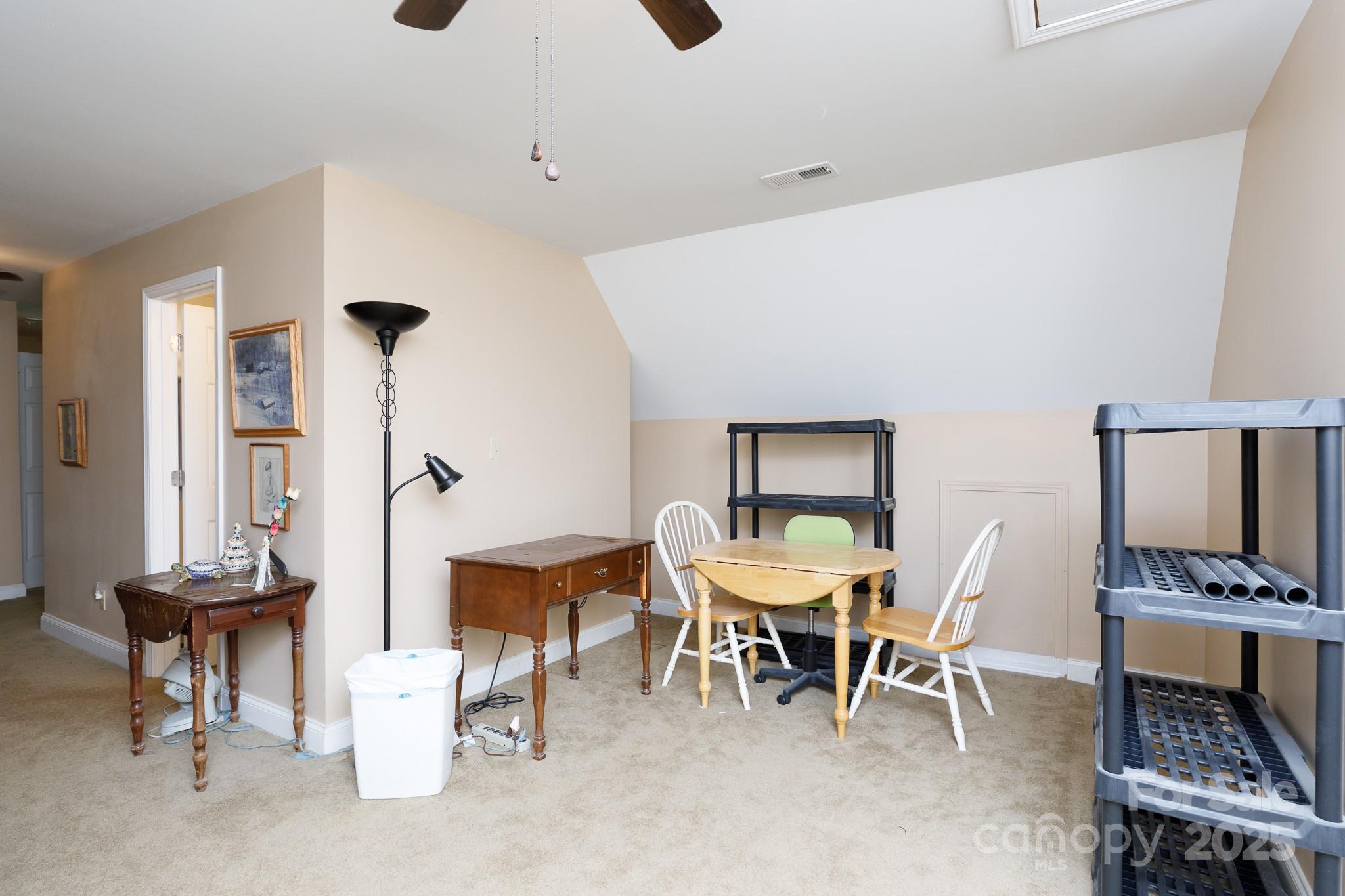 3199 Harmony Road Catawba, SC 29704 - Photo 24 of 46 a dining room with furniture and a mirror