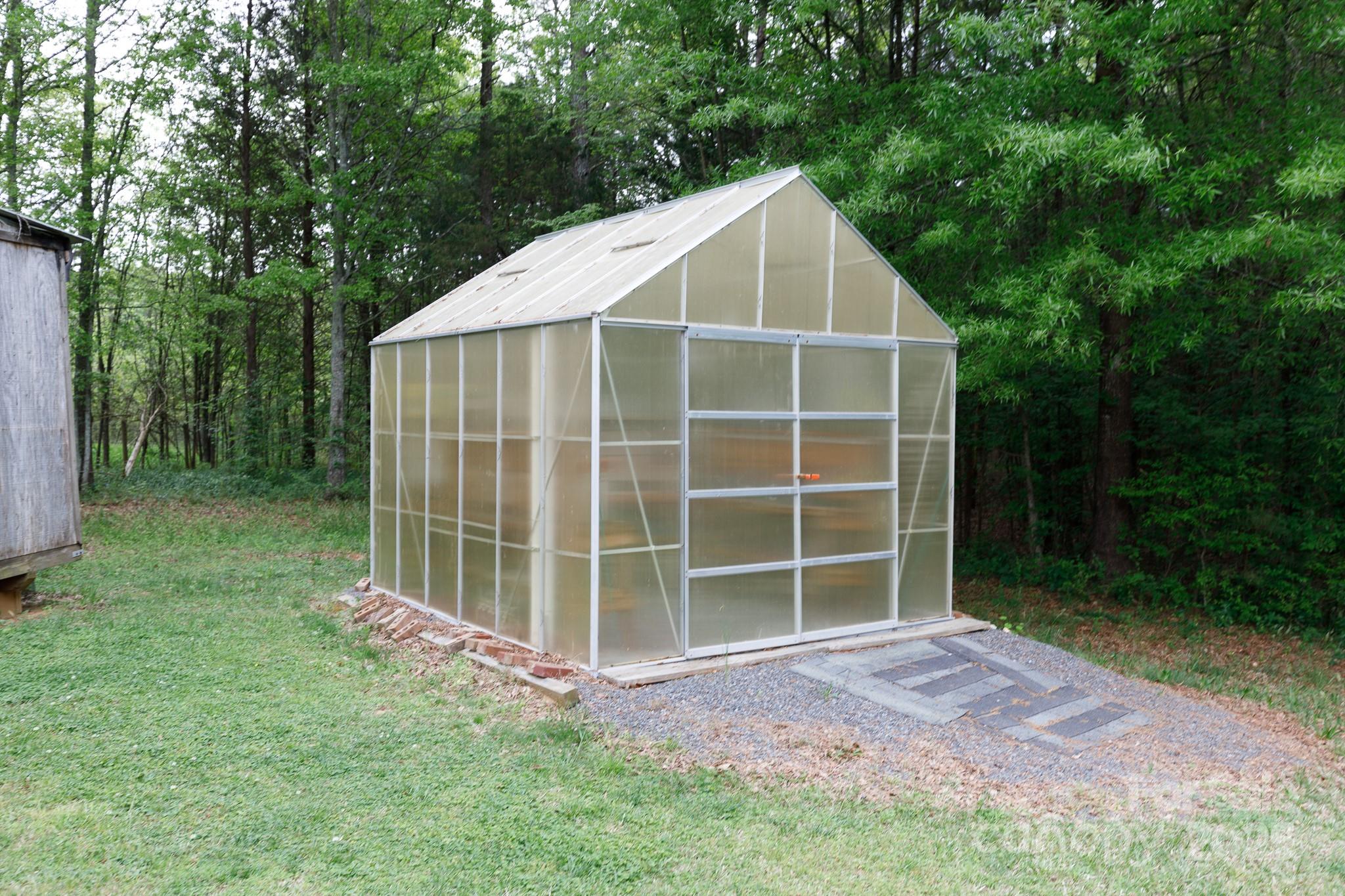 3199 Harmony Road Catawba, SC 29704 - Photo 39 of 46 a view of an house with backyard and trees