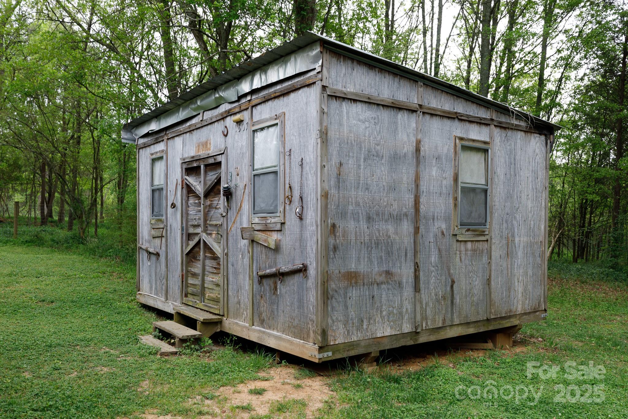 3199 Harmony Road Catawba, SC 29704 - Photo 42 of 46 a wooden house with a outdoor space
