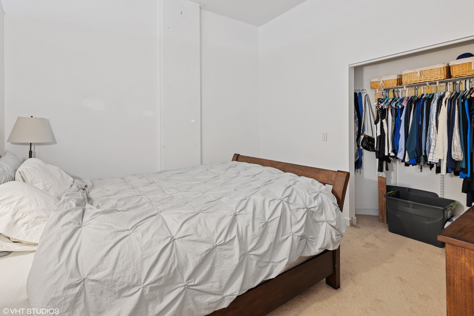 910 West Madison Street, Unit 603 Chicago, IL 60607 - Photo 12 of 15 a bed sitting in a bedroom next to a window