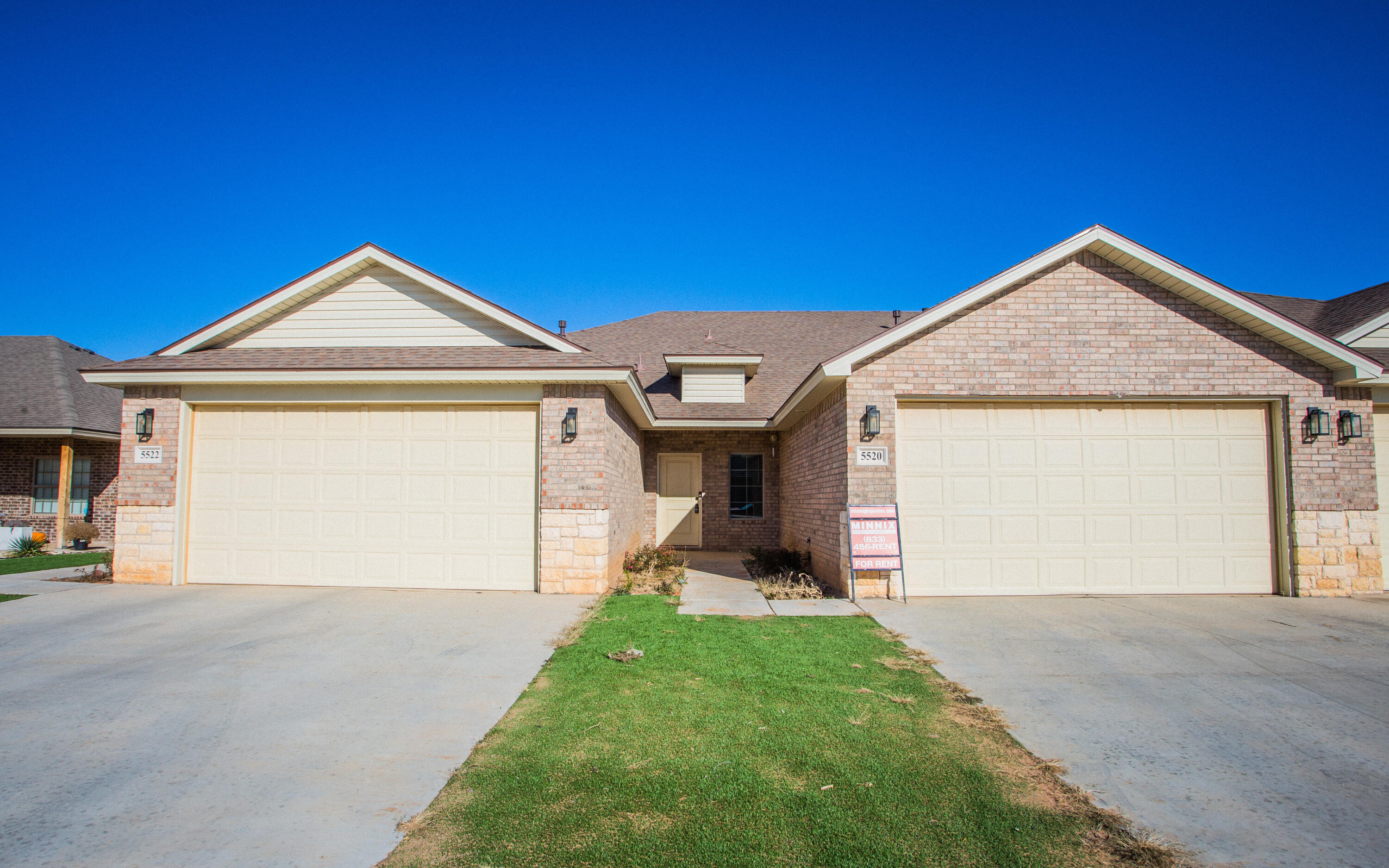 5520 Lehigh Street Lubbock, TX 79416 - Photo 1 of 32 a front view of a house with a yard and garage