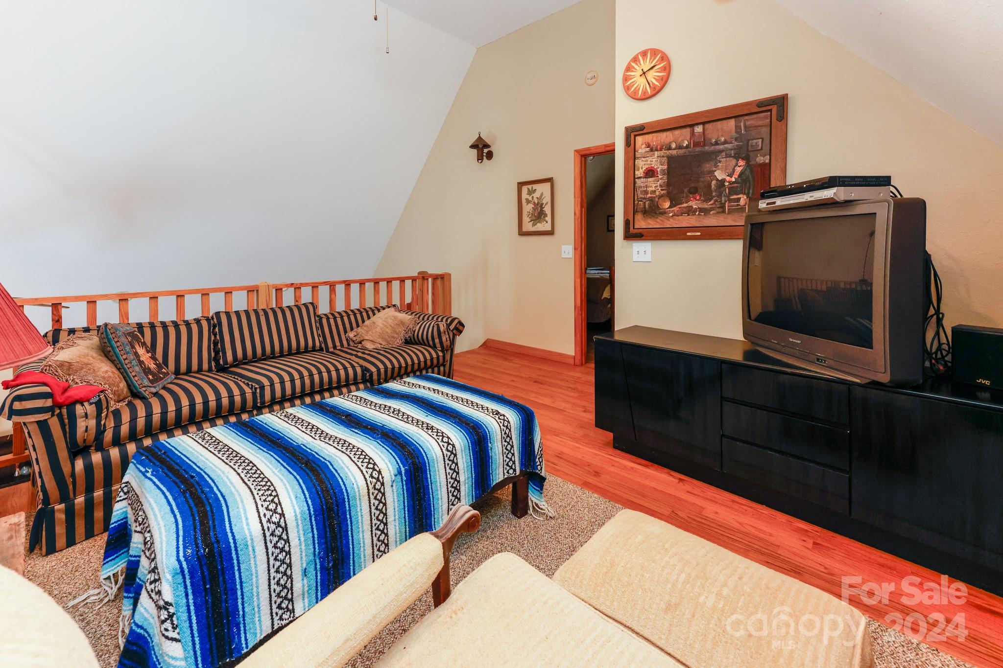 43 Goldfinch Ln Mill Spring Mill Spring, NC 28756 - Photo 21 of 32 a bed room with two beds and a television