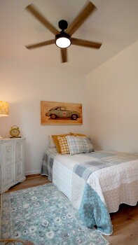 12028 Eaton Court Lyles, TN 37098 - Photo 7 of 10 a bedroom with a bed and a dresser