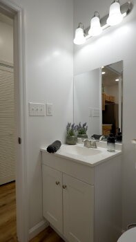 12028 Eaton Court Lyles, TN 37098 - Photo 8 of 10 a bathroom with a sink vanity granite and a mirror