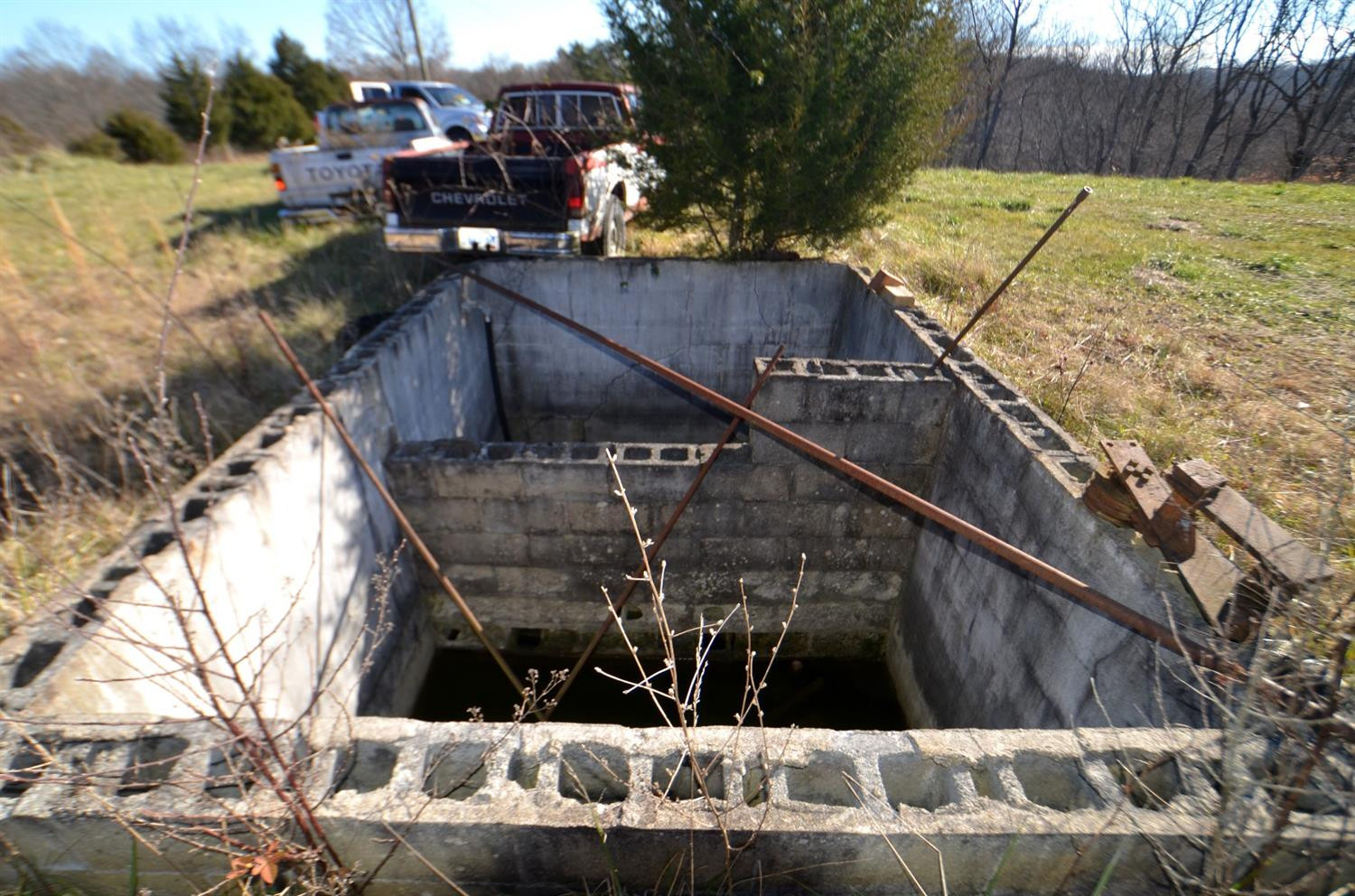 146 Opossum Run Road Irvine, KY 40336 - Photo 26 of 64 Rehab the old cistern to capture rain wa