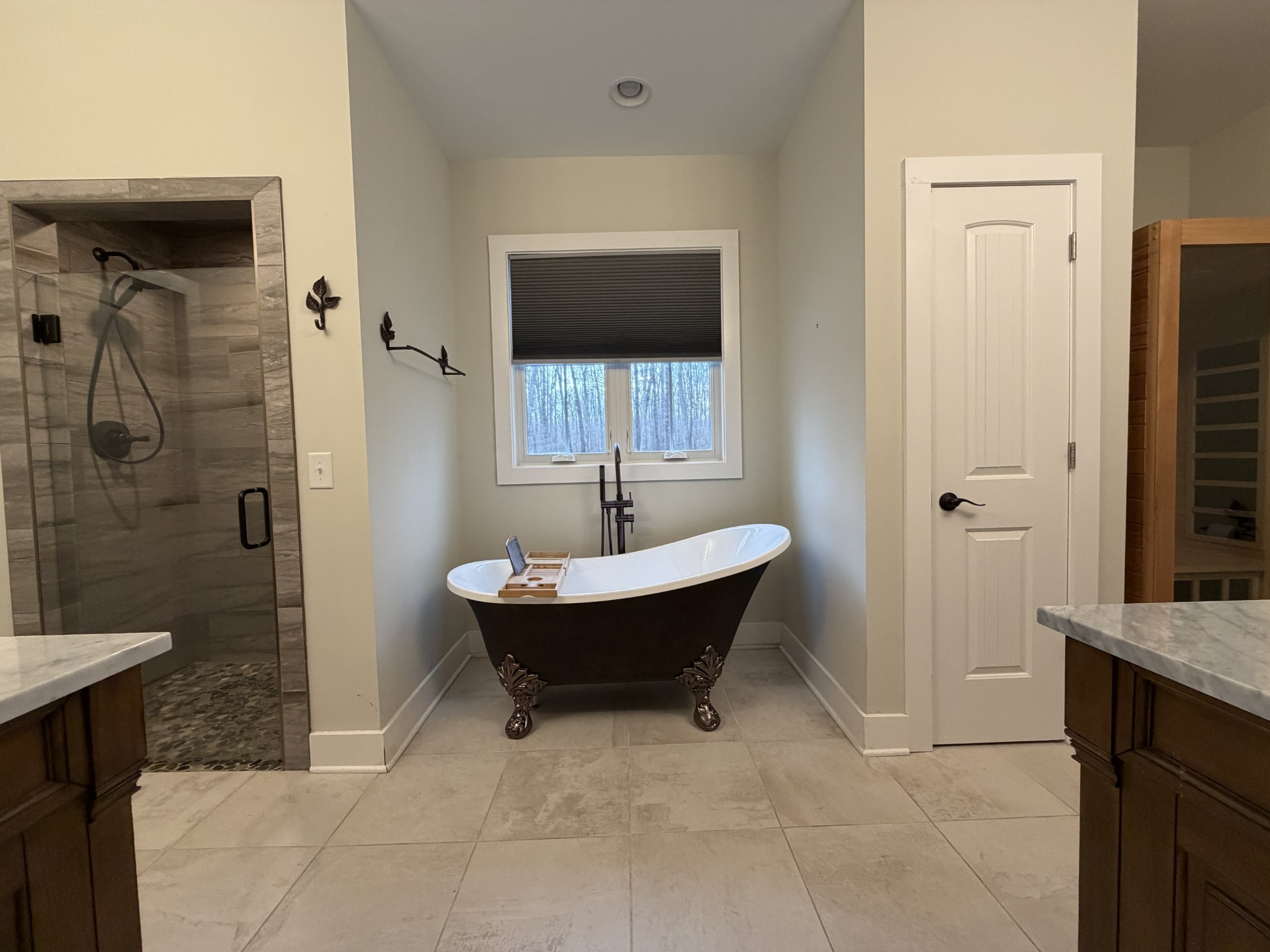 2095 Lake Louisa Loop Monteagle, TN 37356 - Photo 13 of 48 a bathroom with a sink a toilet and shower