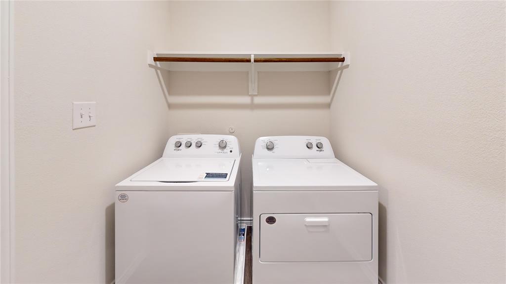 2024 Juniper Pass Way Mesquite, TX 75149 - Photo 11 of 17 a utility room with dryer and washer
