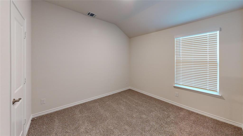 2024 Juniper Pass Way Mesquite, TX 75149 - Photo 5 of 17 an empty room with a window