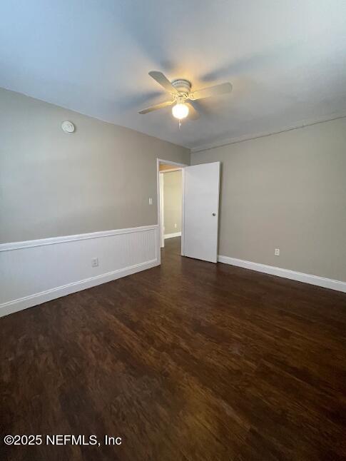 810 2nd Street North, Unit C Jacksonville Beach, FL 32250 - Photo 12 of 17 an empty room with wooden floor and windows