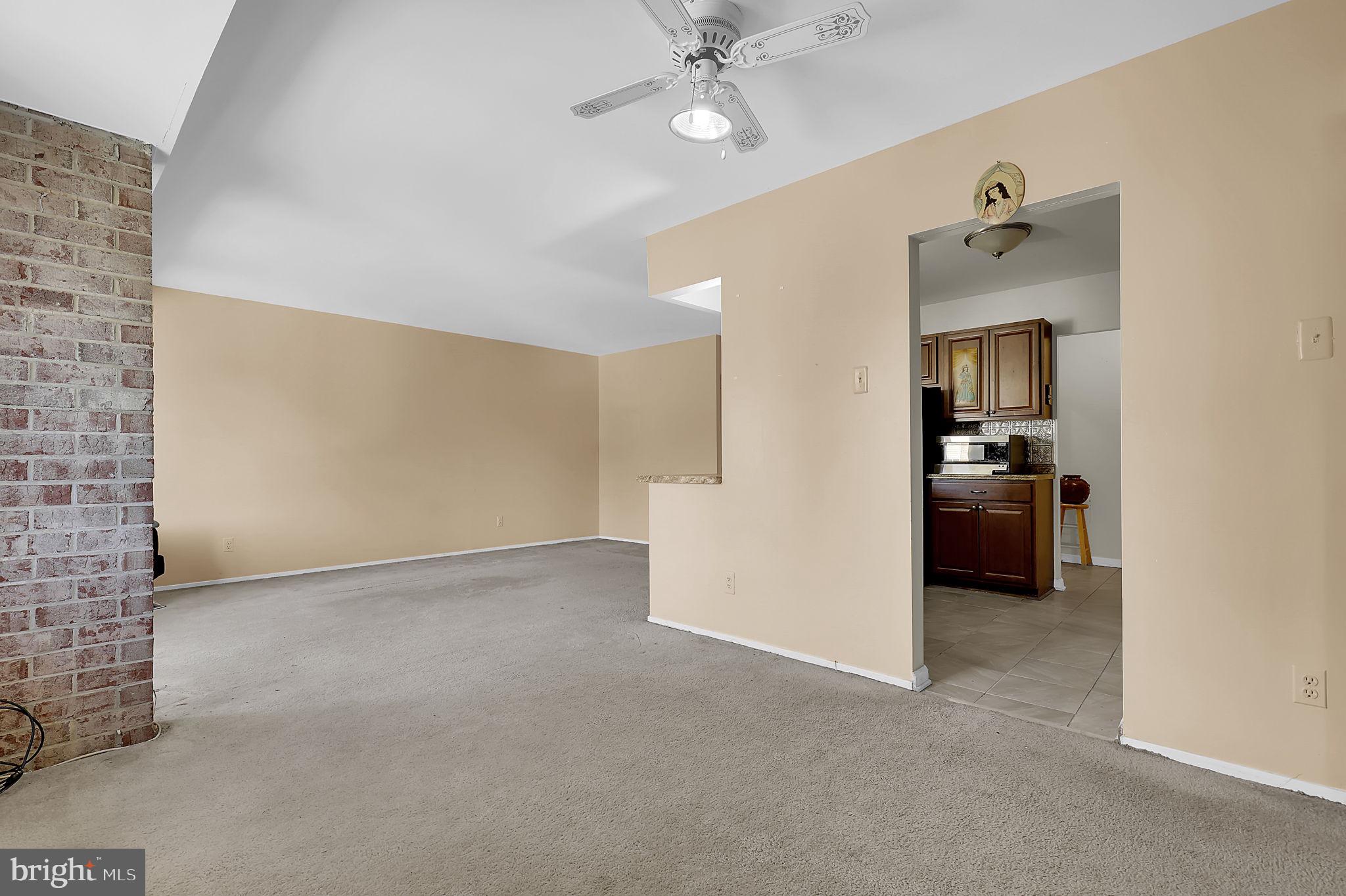 19309 Club House Road, Unit 19309 Gaithersburg, MD 20886 - Photo 6 of 24 a view of a hallway with closet and a bathroom