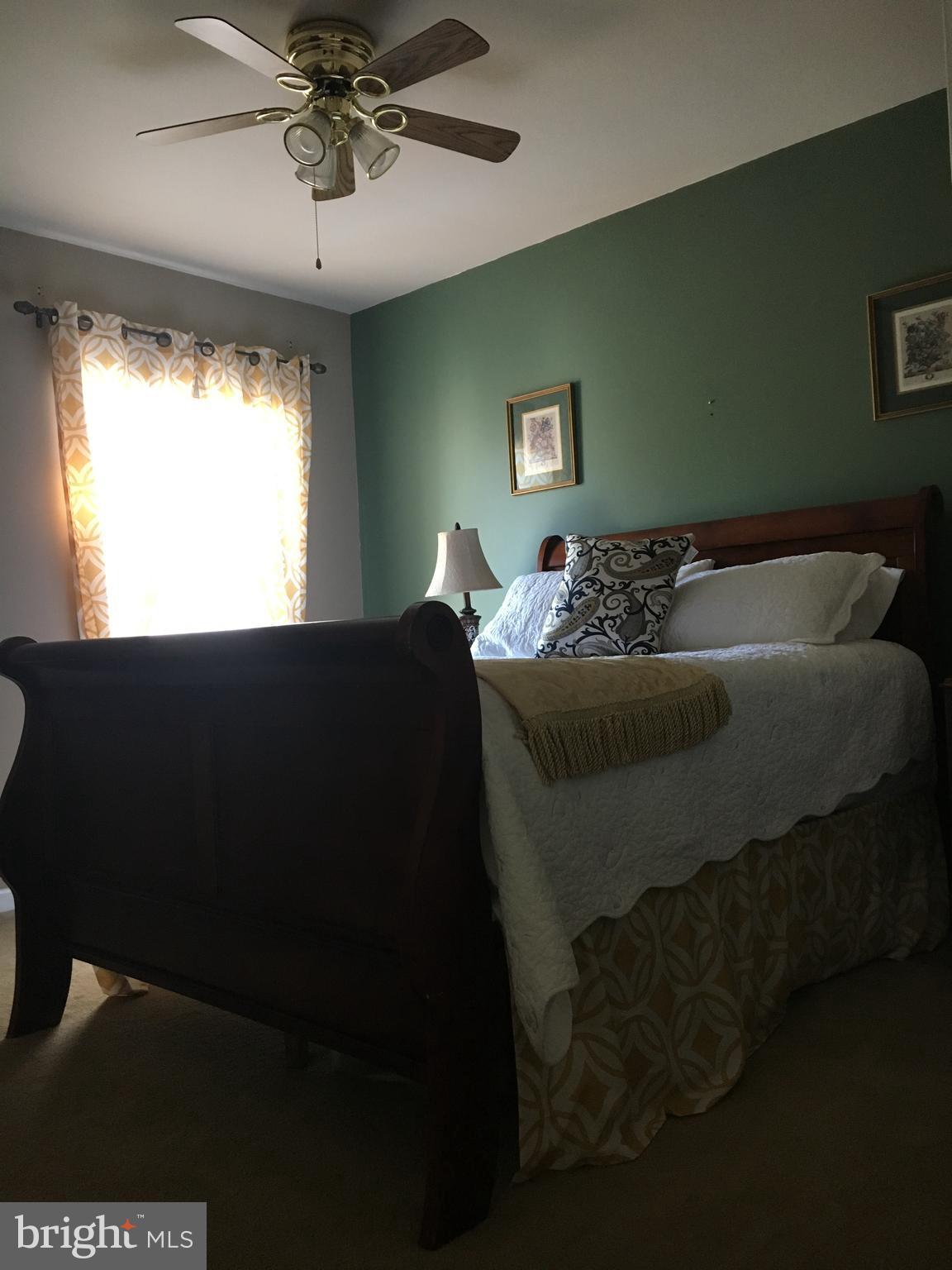 9531 Hallhurst Road Nottingham, MD 21236 - Photo 22 of 30 a bedroom with a bed and window