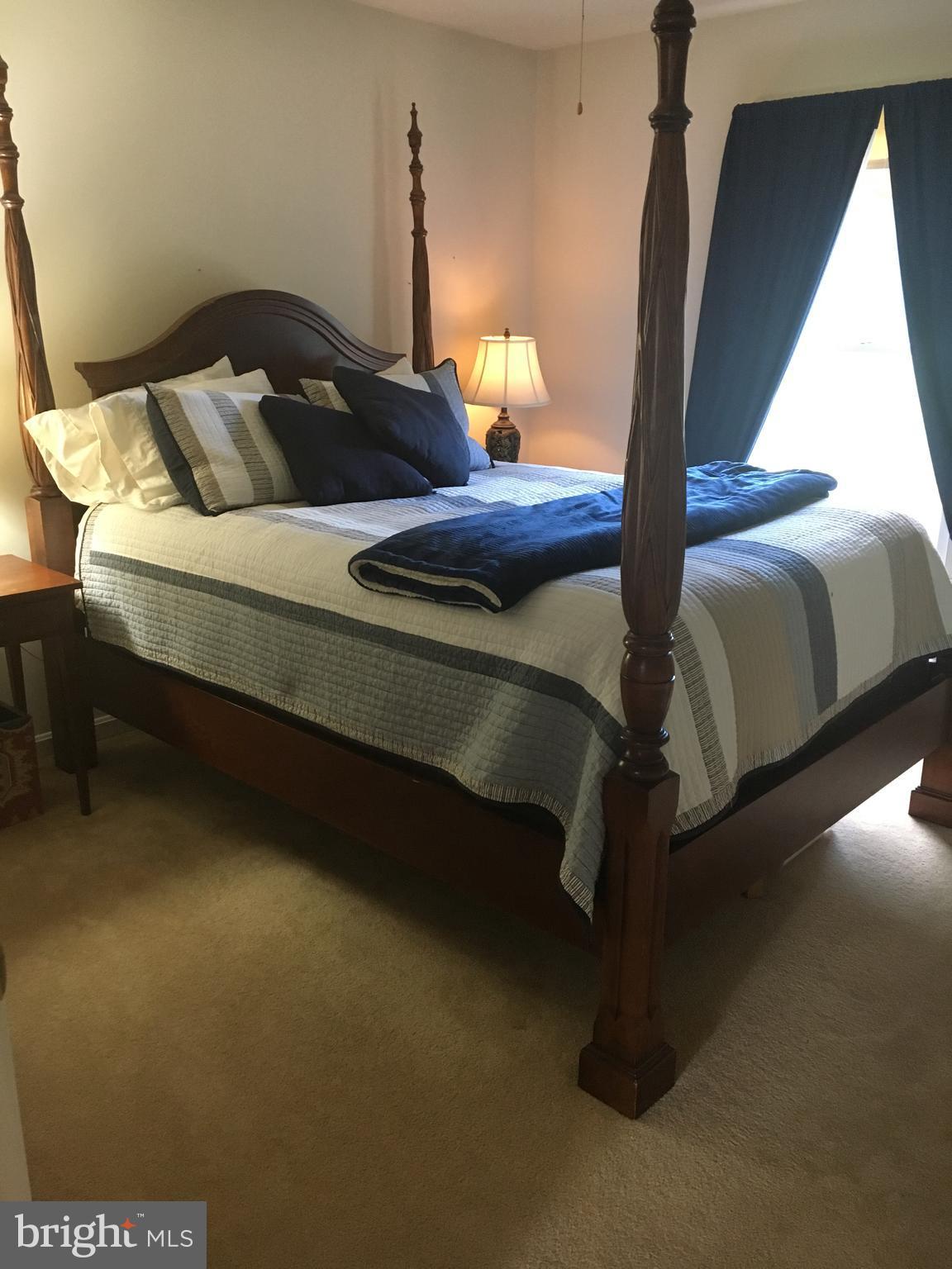 9531 Hallhurst Road Nottingham, MD 21236 - Photo 23 of 30 a bedroom with a bed and window
