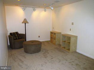 9531 Hallhurst Road Nottingham, MD 21236 - Photo 26 of 30 a living room with furniture and a ceiling fan