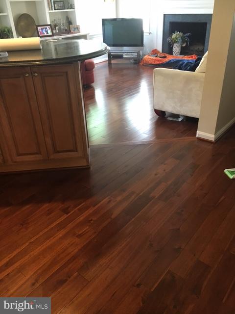 9531 Hallhurst Road Nottingham, MD 21236 - Photo 7 of 30 a living room with wooden floor