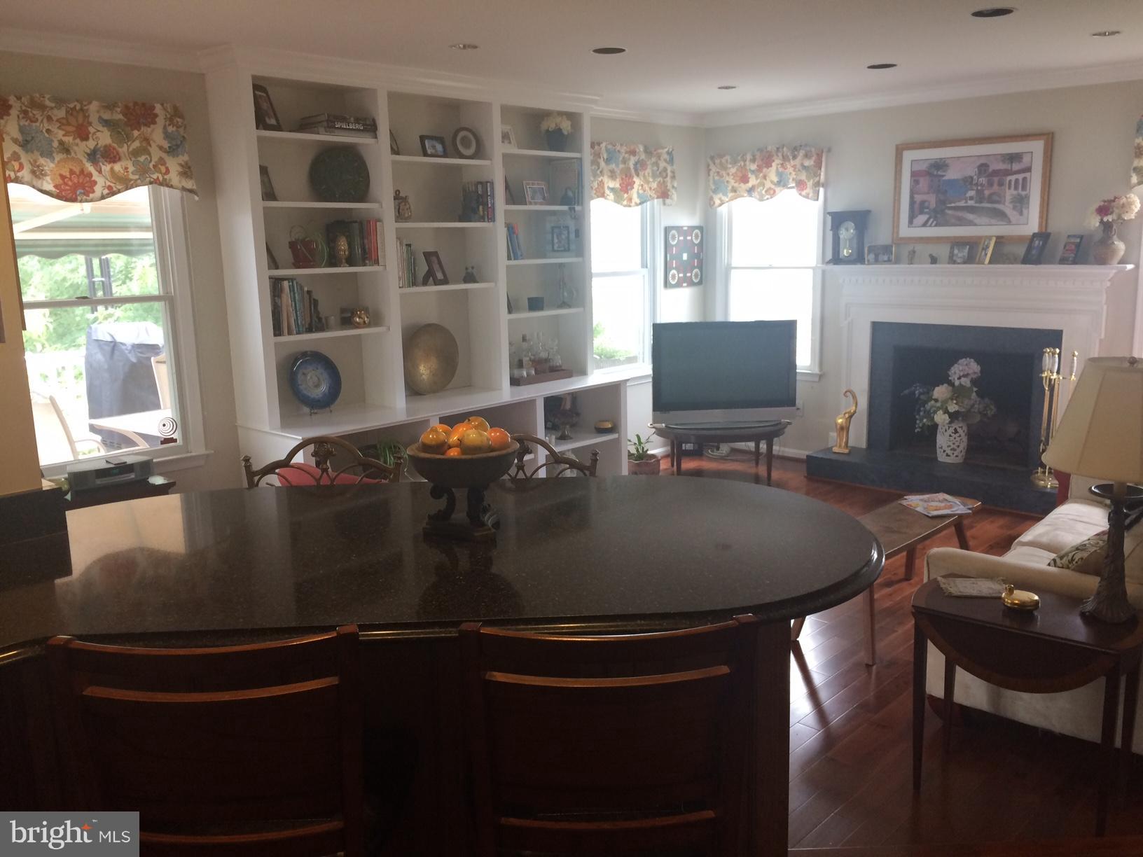 9531 Hallhurst Road Nottingham, MD 21236 - Photo 10 of 30 a room with furniture and a fireplace