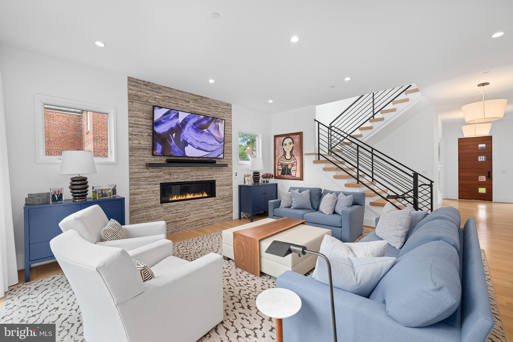 5624 Sherier Place Northwest Washington, DC 20016 - Photo 17 of 60 a living room with fireplace furniture and a fireplace