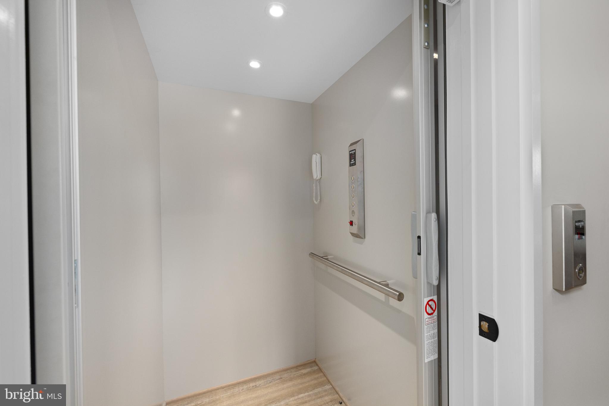 5624 Sherier Place Northwest Washington, DC 20016 - Photo 24 of 60 a bathroom with a shower and a door