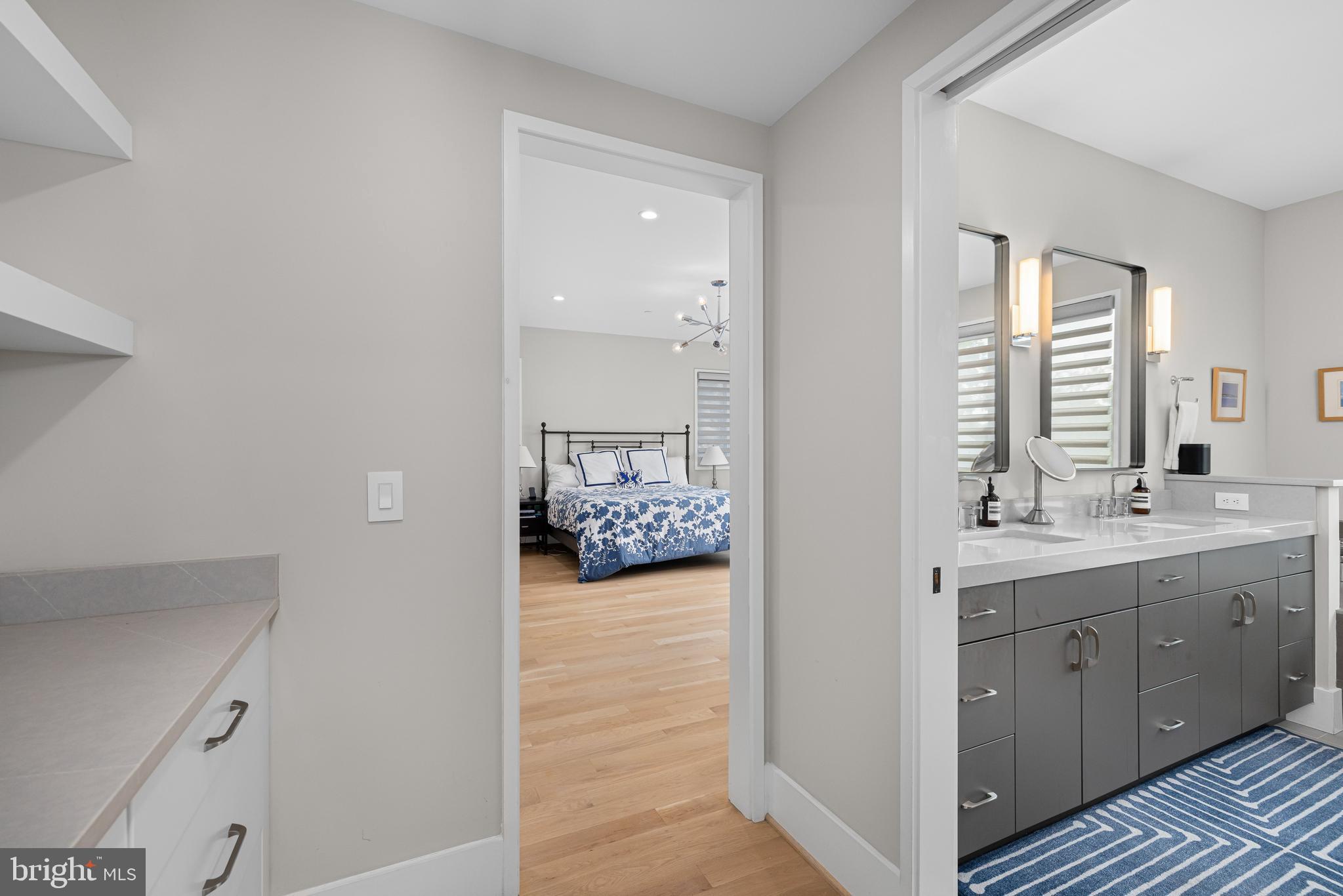 5624 Sherier Place Northwest Washington, DC 20016 - Photo 32 of 60 a en suite bathroom with a sink and a mirror