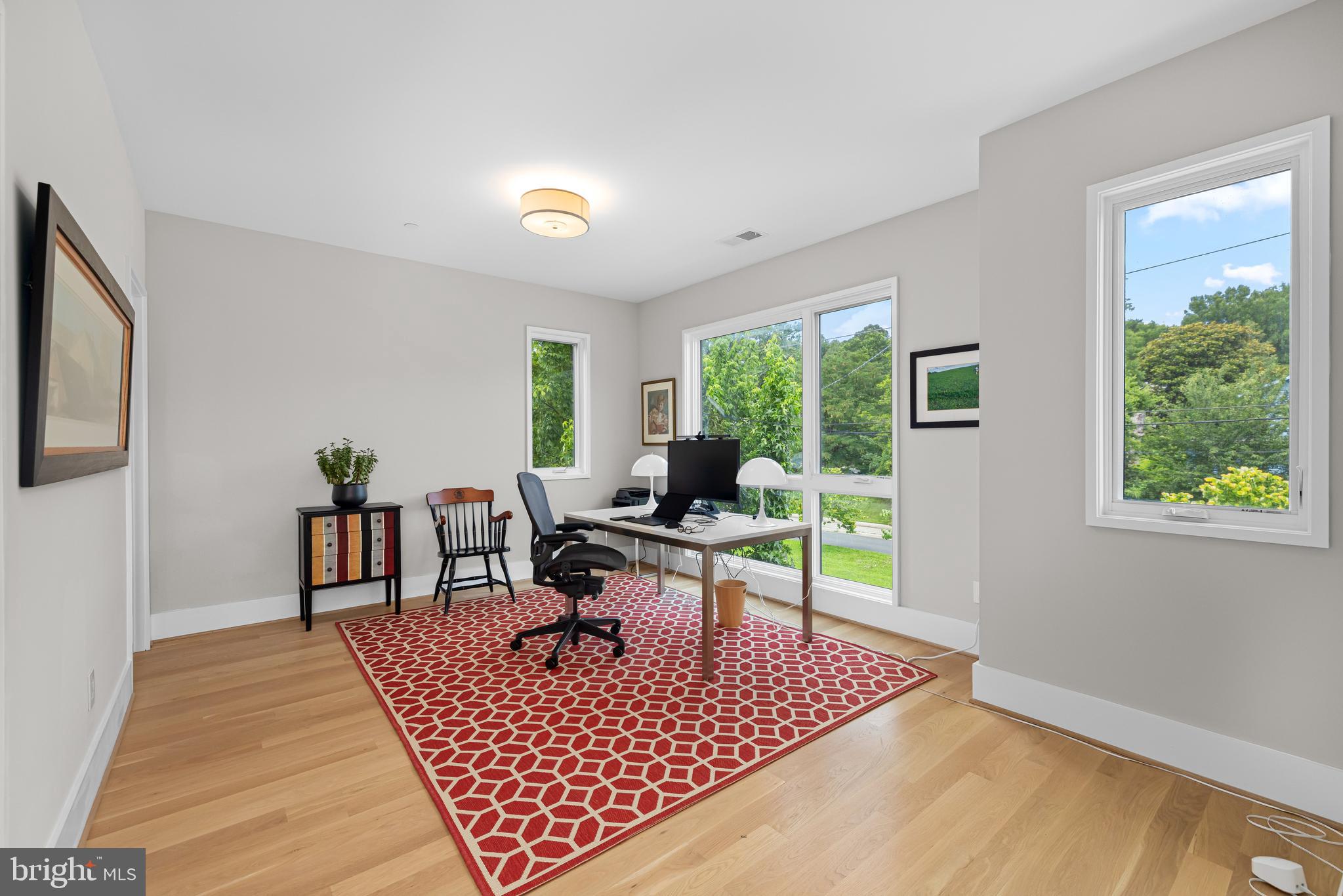 5624 Sherier Place Northwest Washington, DC 20016 - Photo 39 of 60 a living room with furniture rug and window