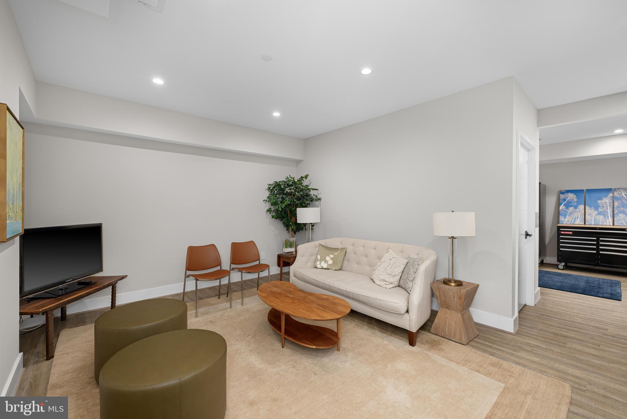 5624 Sherier Place Northwest Washington, DC 20016 - Photo 54 of 60 a living room with furniture and a flat screen tv