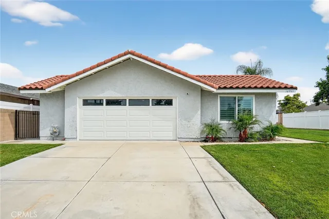 a front view of a house with yard