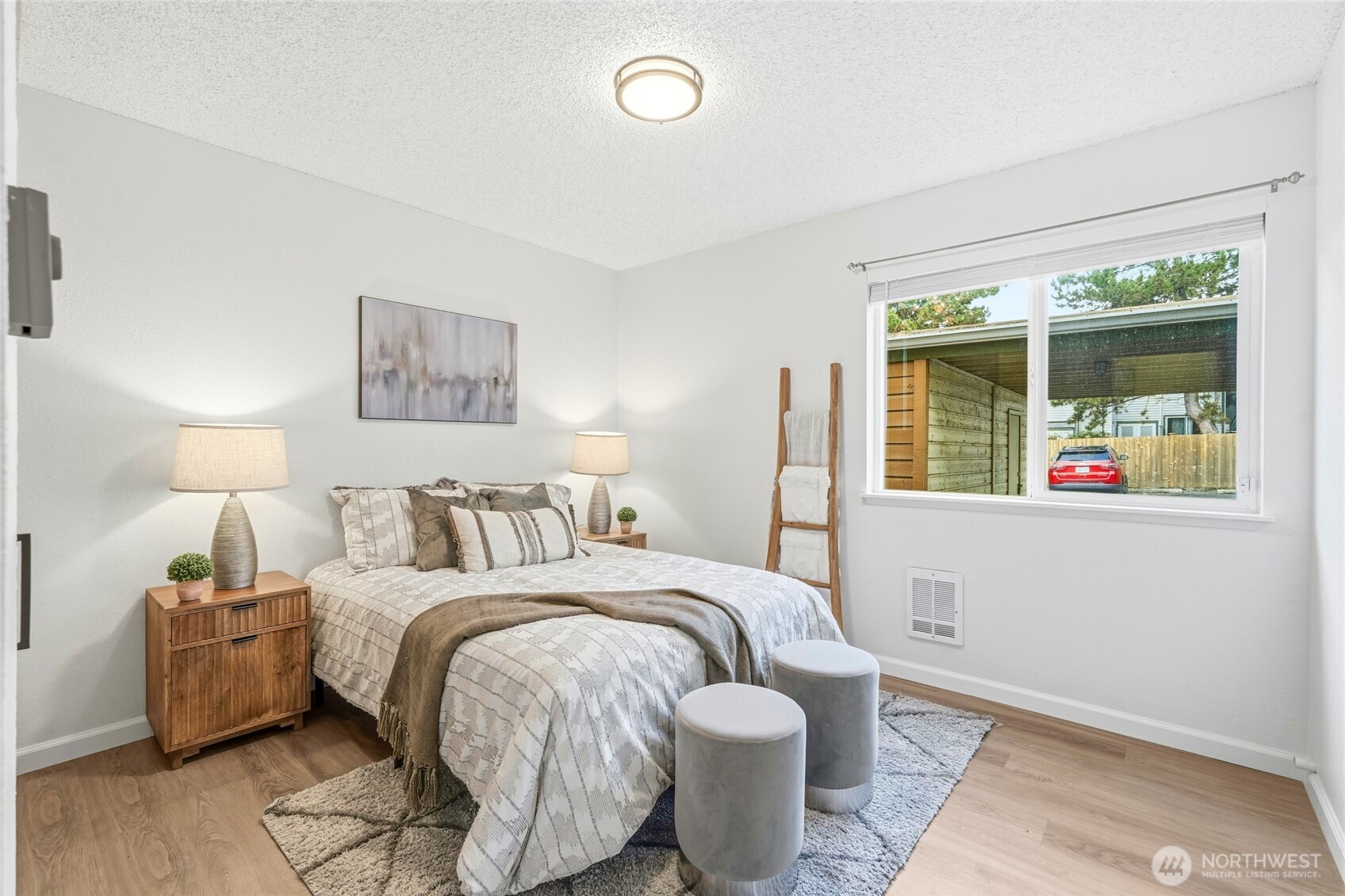 23601 112th Avenue Southeast, Unit A103 Kent, WA 98031 - Photo 20 of 26 a bed room with a bed and a window