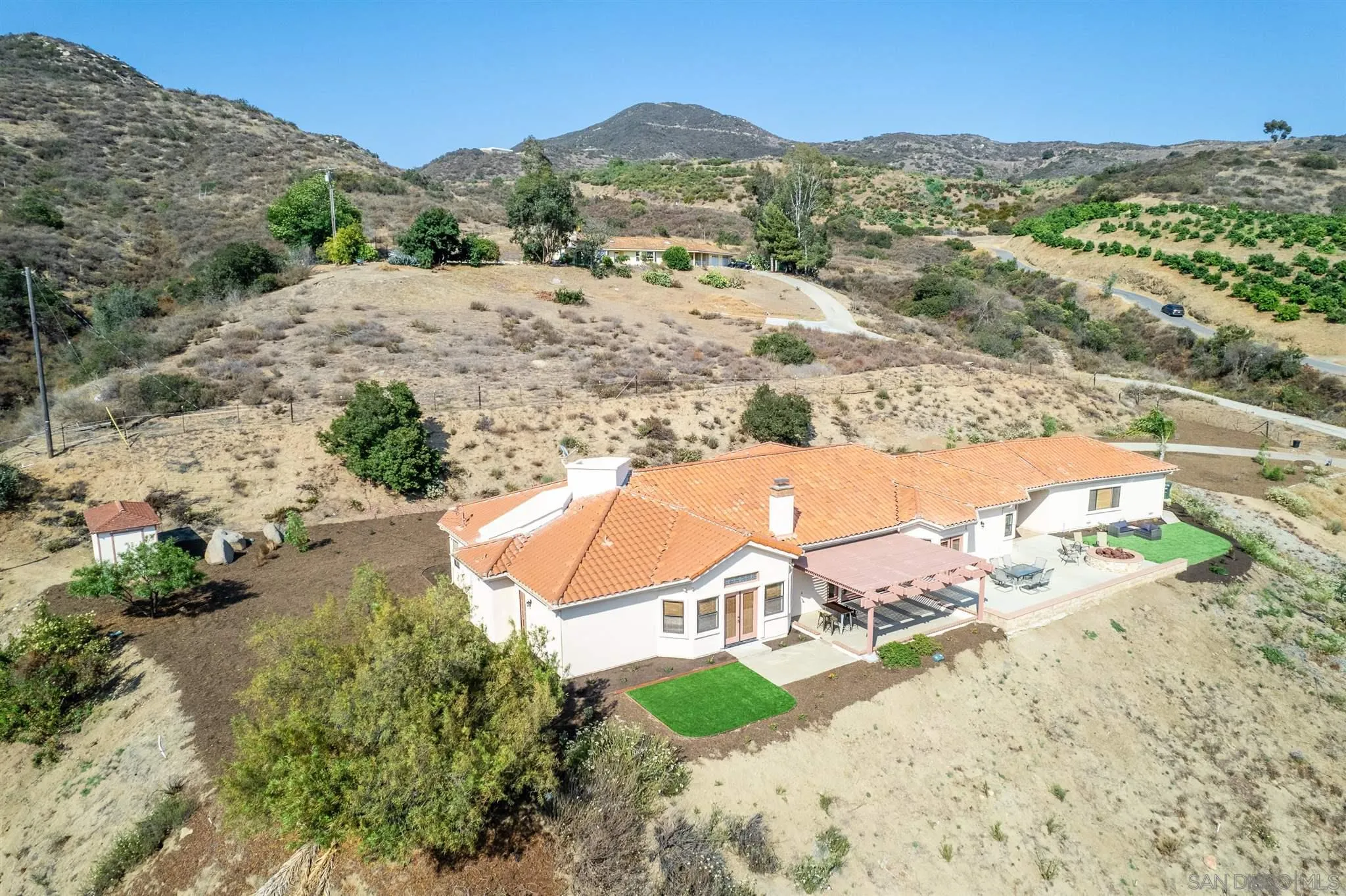9340 Huntley Road Fallbrook, CA 92028 - Photo 42 of 49 a view of a mountain with an ocean