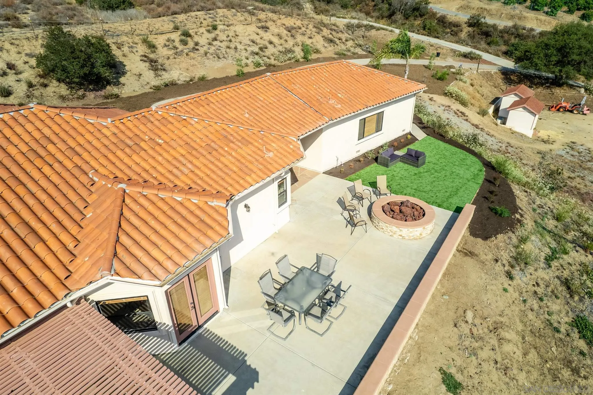 9340 Huntley Road Fallbrook, CA 92028 - Photo 45 of 49 a view of a swimming pool with a patio