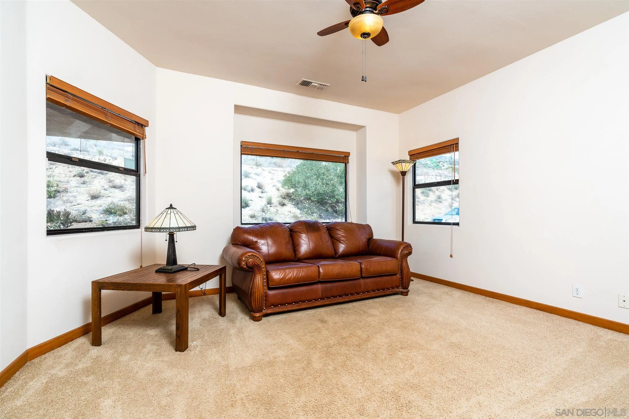 9340 Huntley Road Fallbrook, CA 92028 - Photo 9 of 49 a living room with furniture and a window