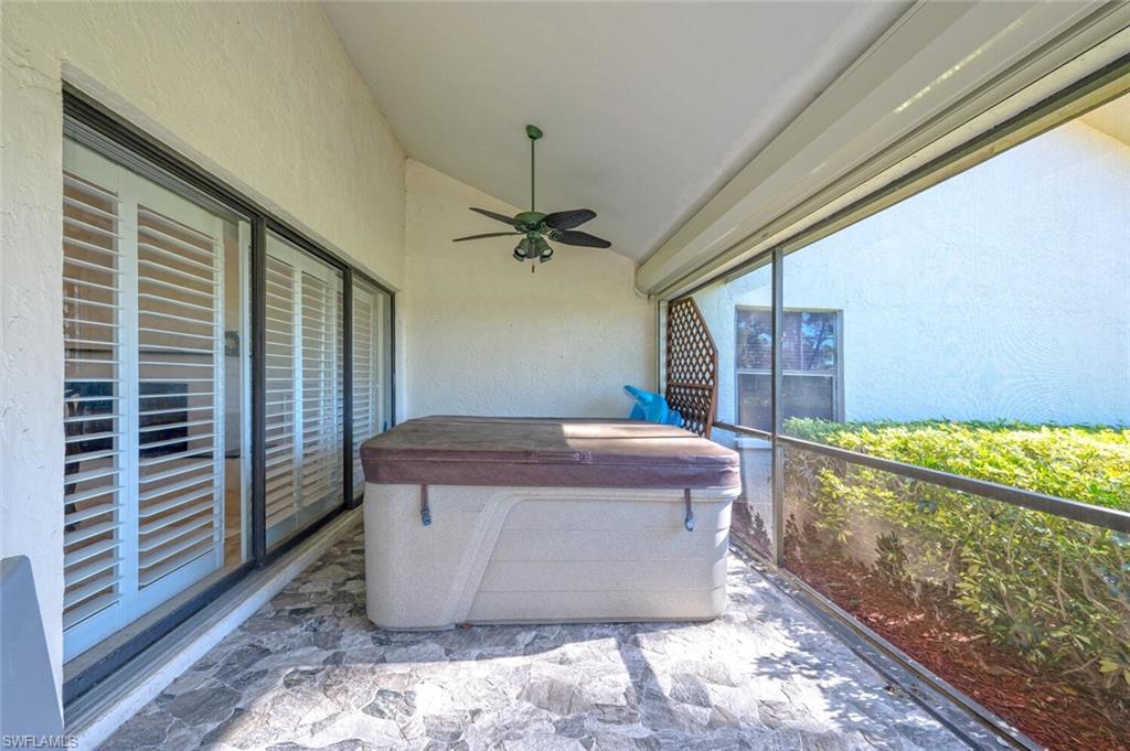 640 Augusta Boulevard Naples, FL 34113 - Photo 15 of 29 a room with a large window and furniture