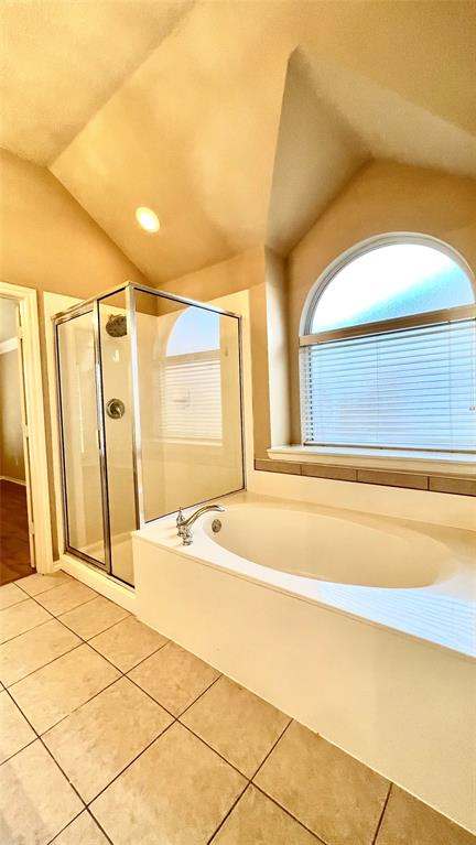 2712 Flint Rock Drive Fort Worth, TX 76131 - Photo 14 of 26 a bathroom with a bathtub and a shower
