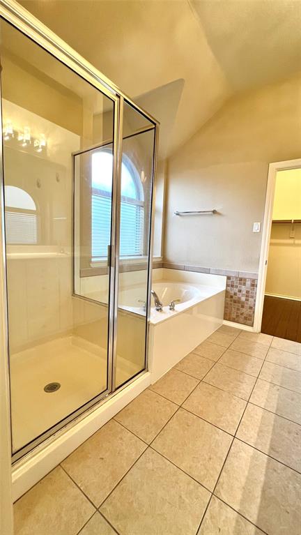 2712 Flint Rock Drive Fort Worth, TX 76131 - Photo 17 of 26 a spacious bathroom with a tub and shower