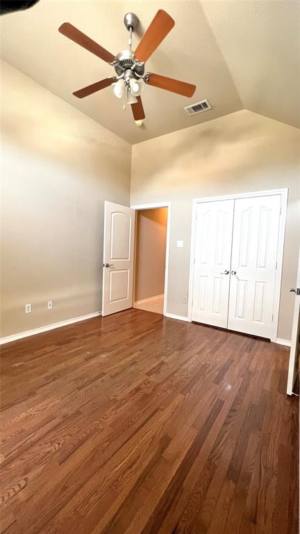 2712 Flint Rock Drive Fort Worth, TX 76131 - Photo 21 of 26 an empty room with wooden floor and ceiling fan