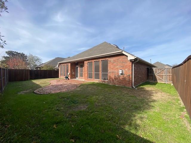 2712 Flint Rock Drive Fort Worth, TX 76131 - Photo 26 of 26 a backyard of a house with lots of green space