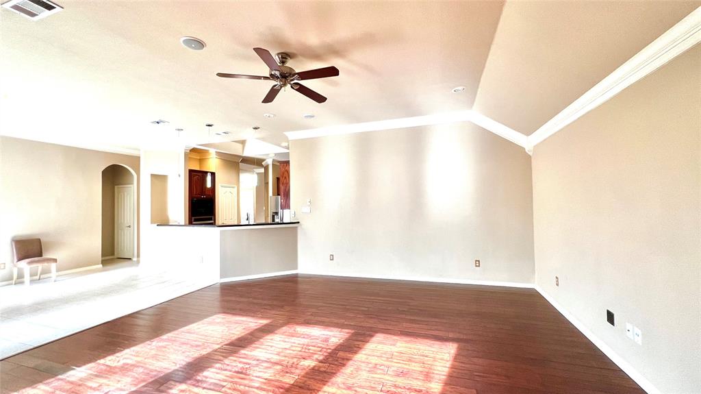 2712 Flint Rock Drive Fort Worth, TX 76131 - Photo 4 of 26 a view of a room with window and ceiling fan