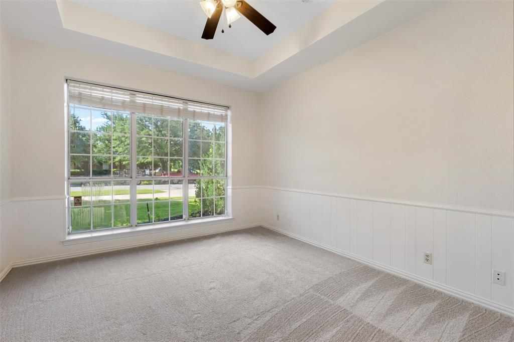 609 Seville Road Denton, TX 76205 - Photo 19 of 40 Bedroom off front entry & living room, can be guest room or office.