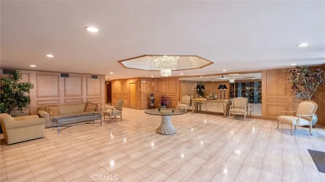 a living room with furniture and white walls