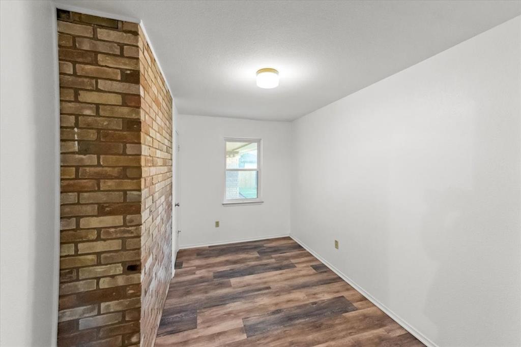 1812 Trinity Drive Waco, TX 76710 - Photo 11 of 24 a view of an empty room and window