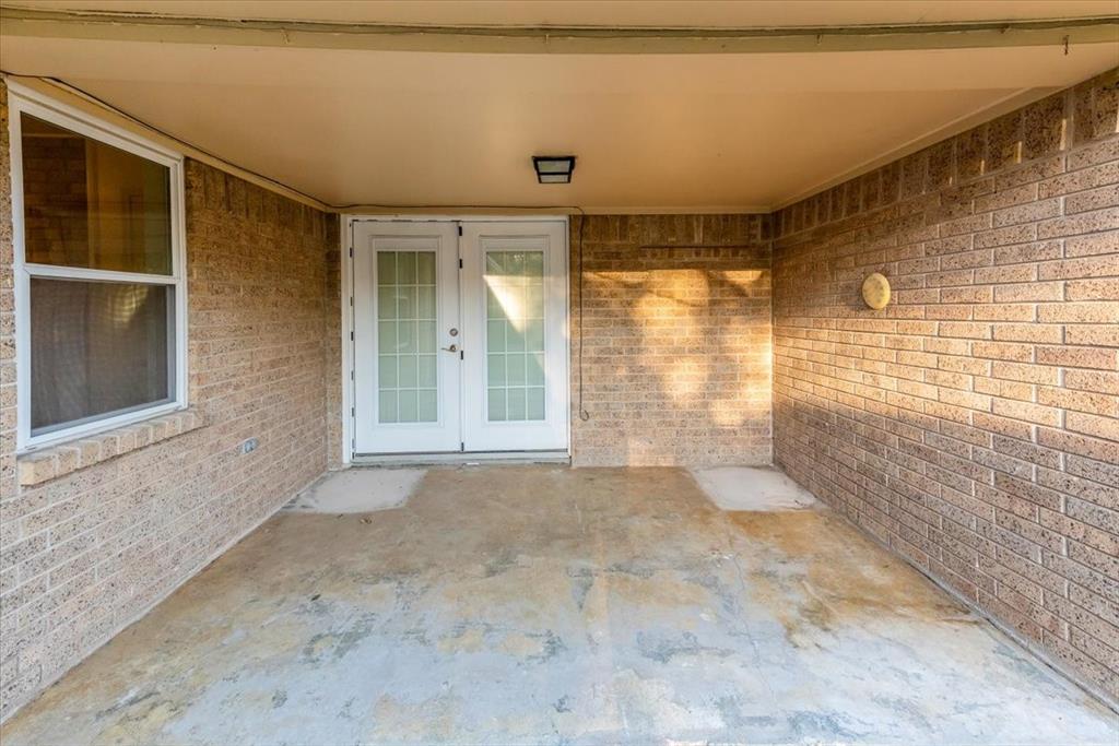 1812 Trinity Drive Waco, TX 76710 - Photo 19 of 24 a view of an empty room with a window