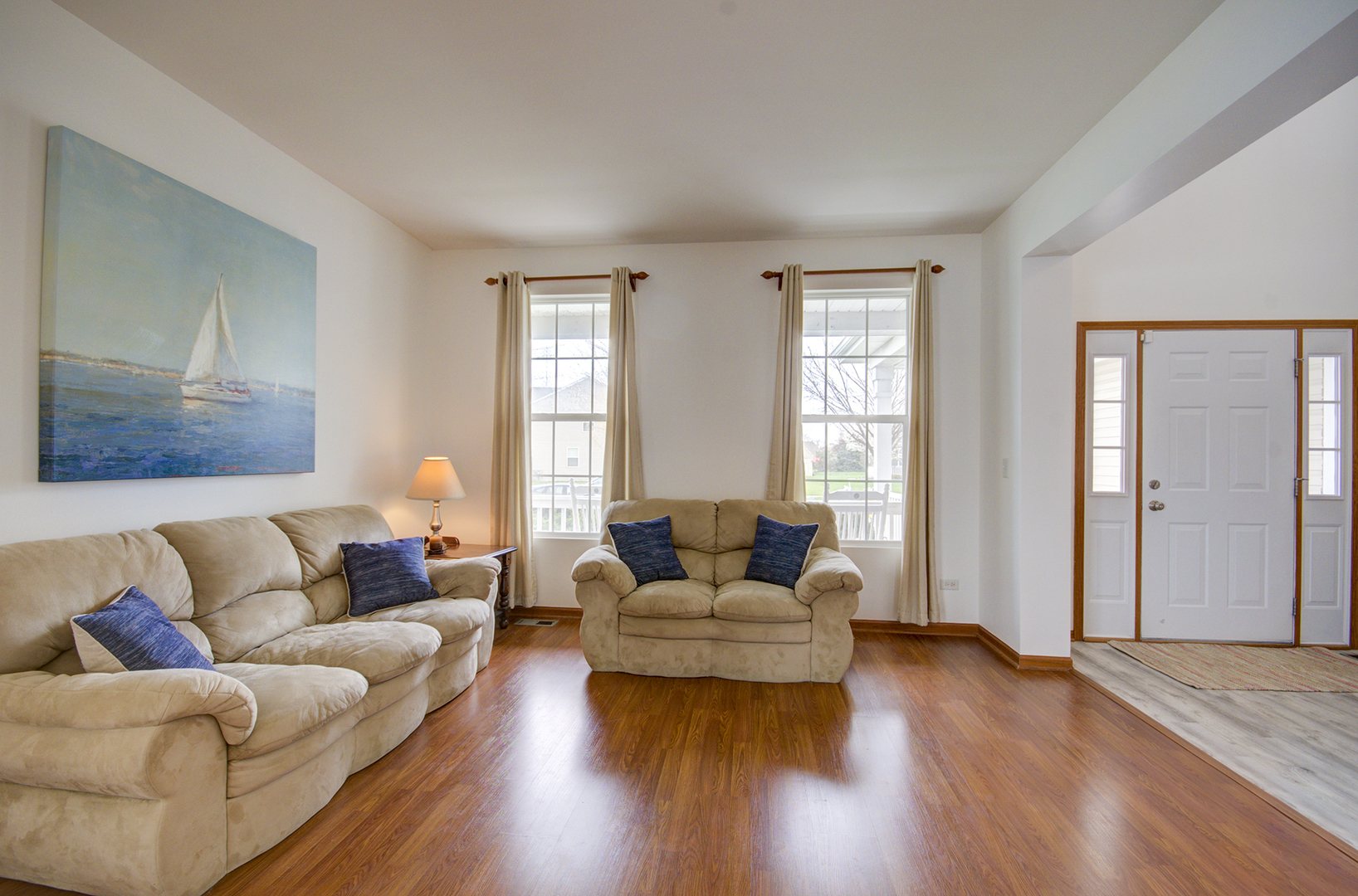 6417 Roth Drive Joliet, IL 60431 - Photo 3 of 32 a living room with furniture and a large window