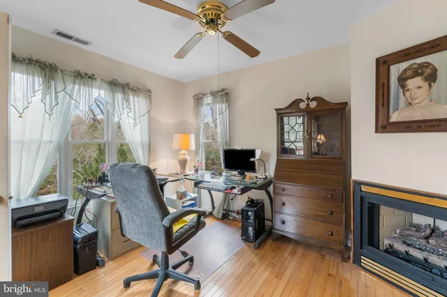 a bedroom with a bed furniture and a window