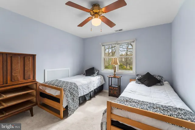 a view of an entryway with wooden floor and stairs
