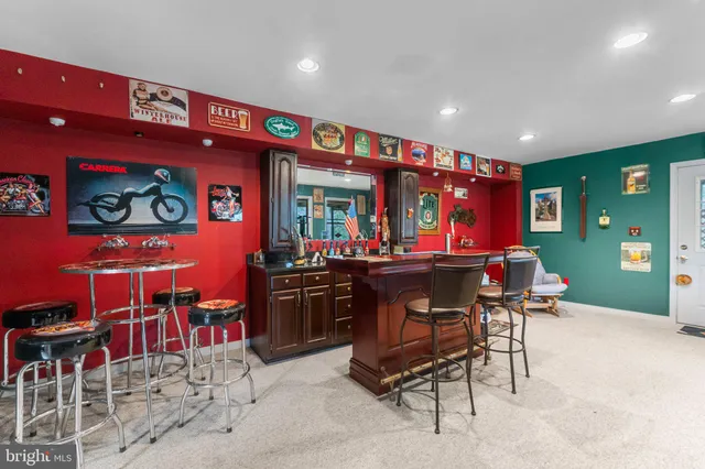 a view of a house with wooden deck