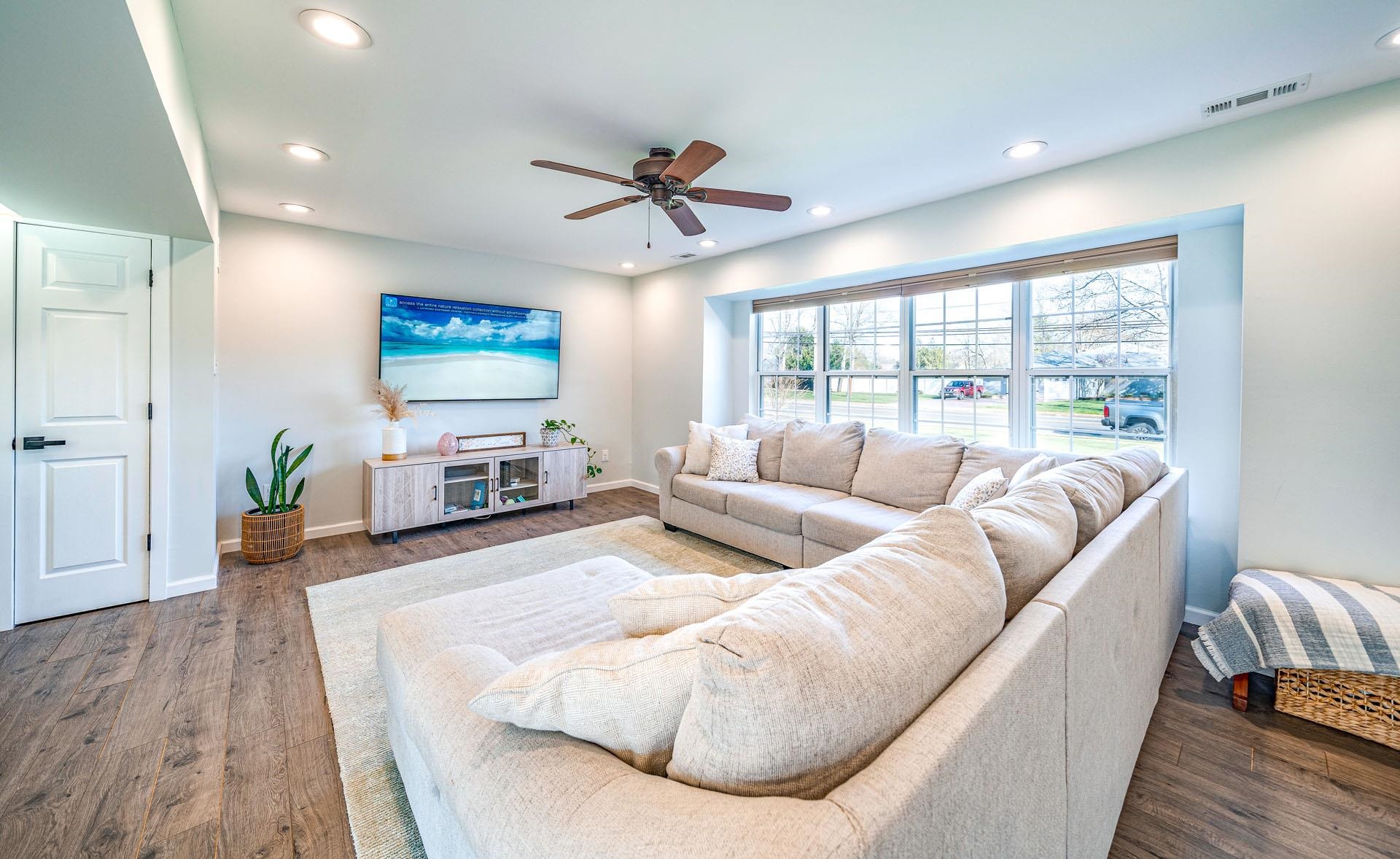 656 Stagecoach Road Marmora, NJ 08223 - Photo 6 of 45 a living room with furniture and a flat screen tv