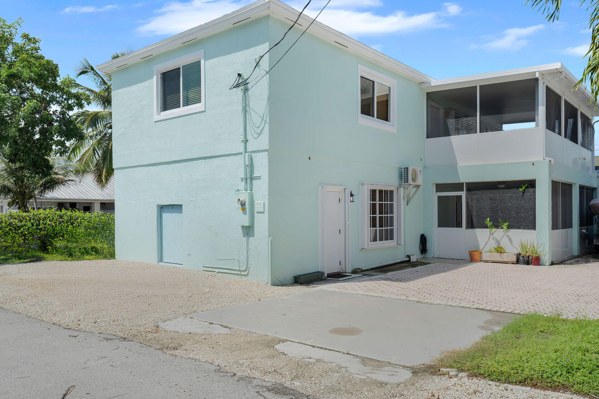 64 Coconut Drive Key Largo, FL 33037 - Photo 39 of 44 a view of a house with a yard
