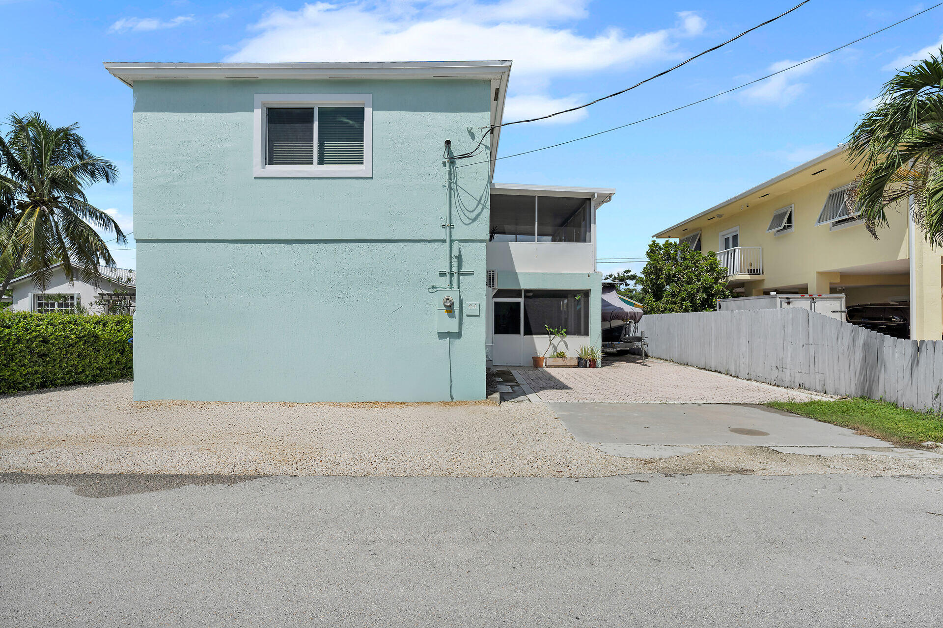 64 Coconut Drive Key Largo, FL 33037 - Photo 40 of 44 a view of a house with a street